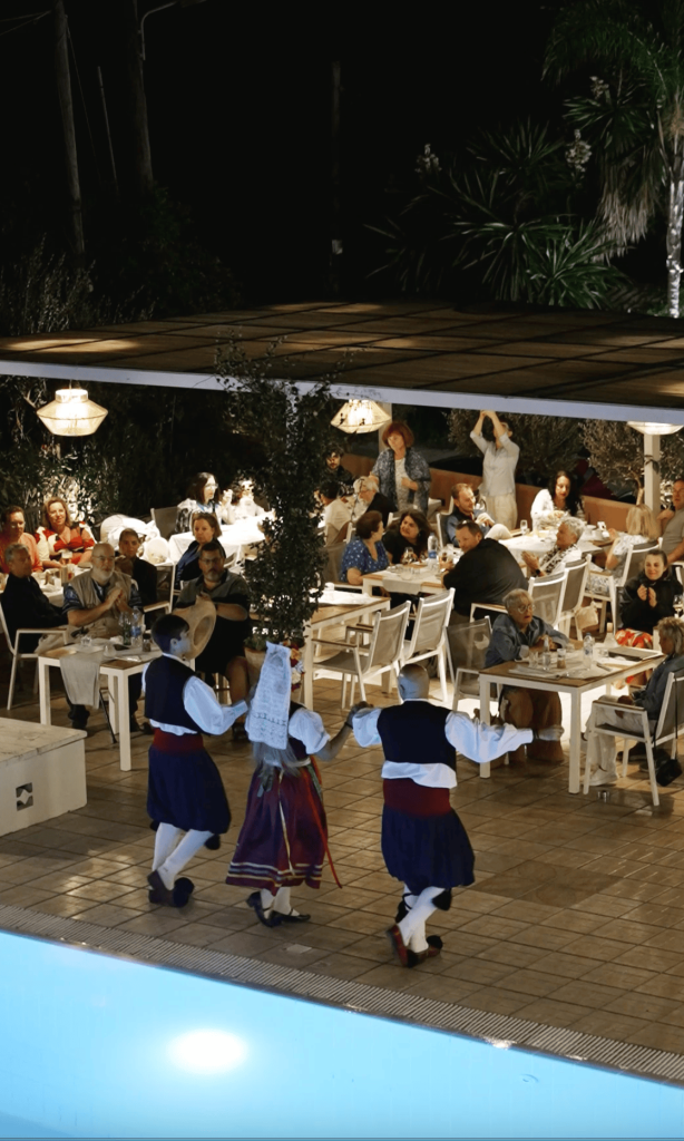 Experience an authentic Greek Night in Ipsos, Corfu with live traditional music, local dancing and homemade cuisine at Dominoes Corfu. Open to Public